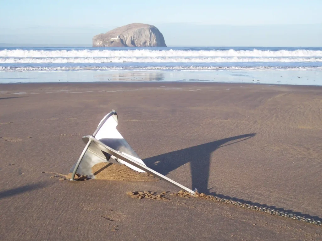 Knox Anchor resting on the sand